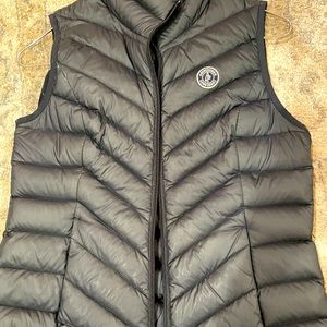 This is a classic Abercrombie and Fitch vest. Color is navy blue